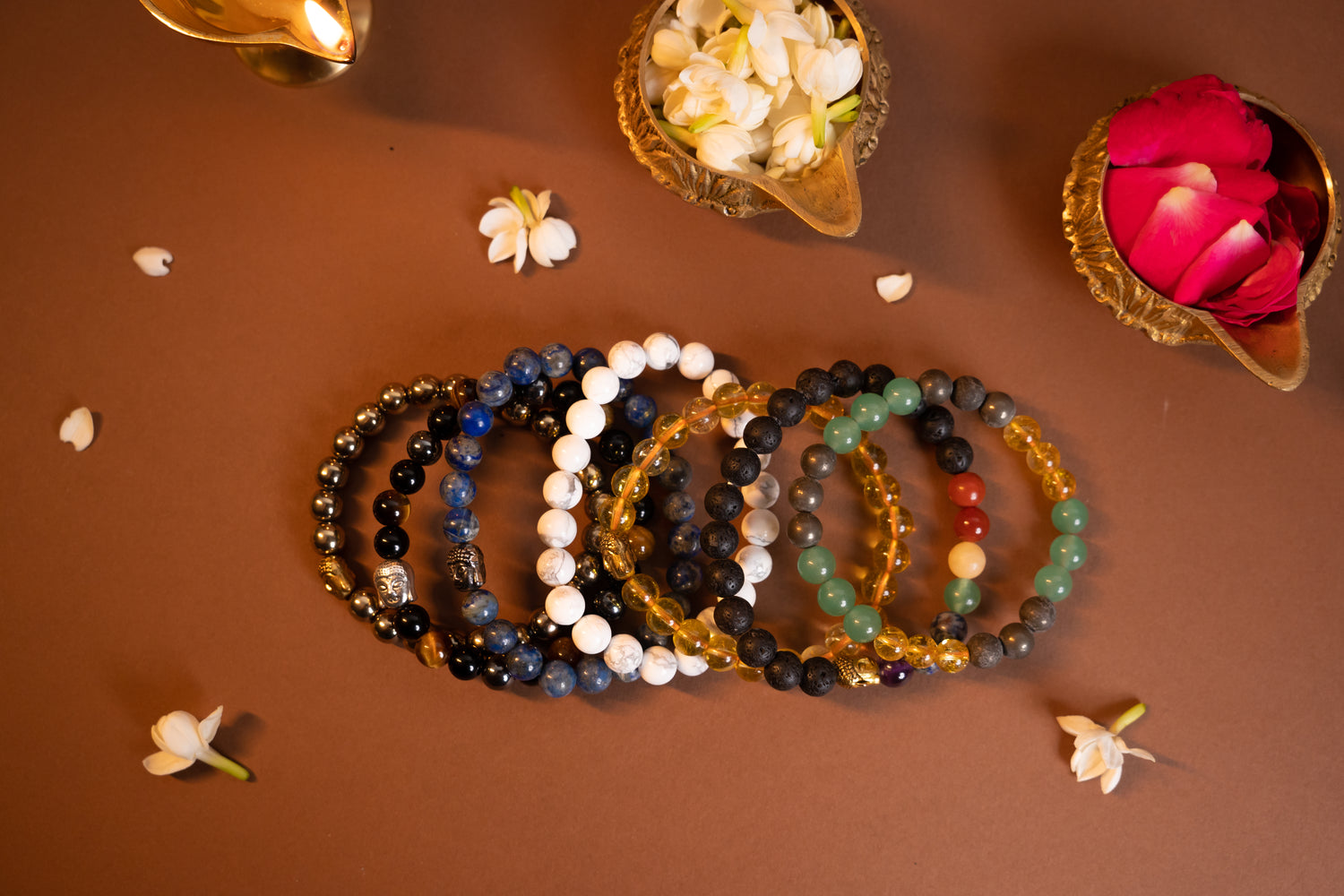 A colorful set of crystal healing bracelets, each designed for specific energies and intentions