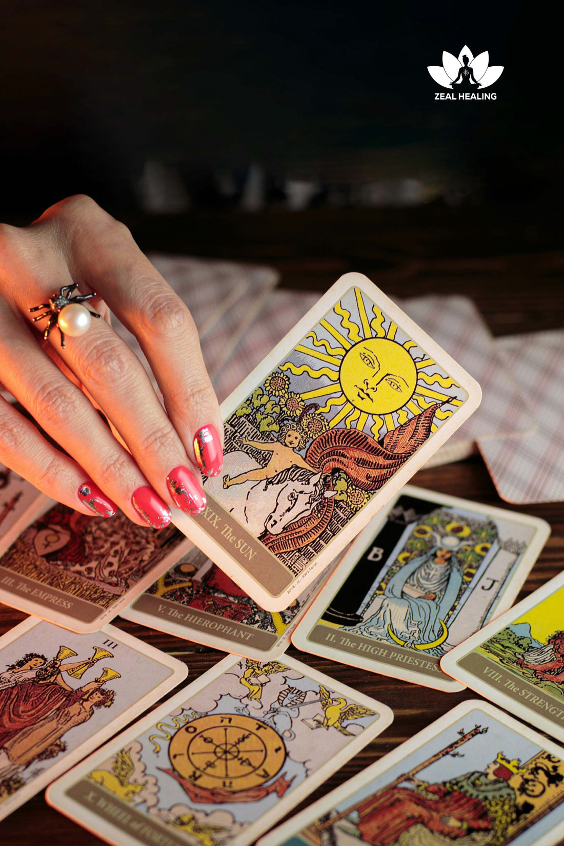 A spread of colorful tarot cards used for spiritual guidance and intuitive readings.