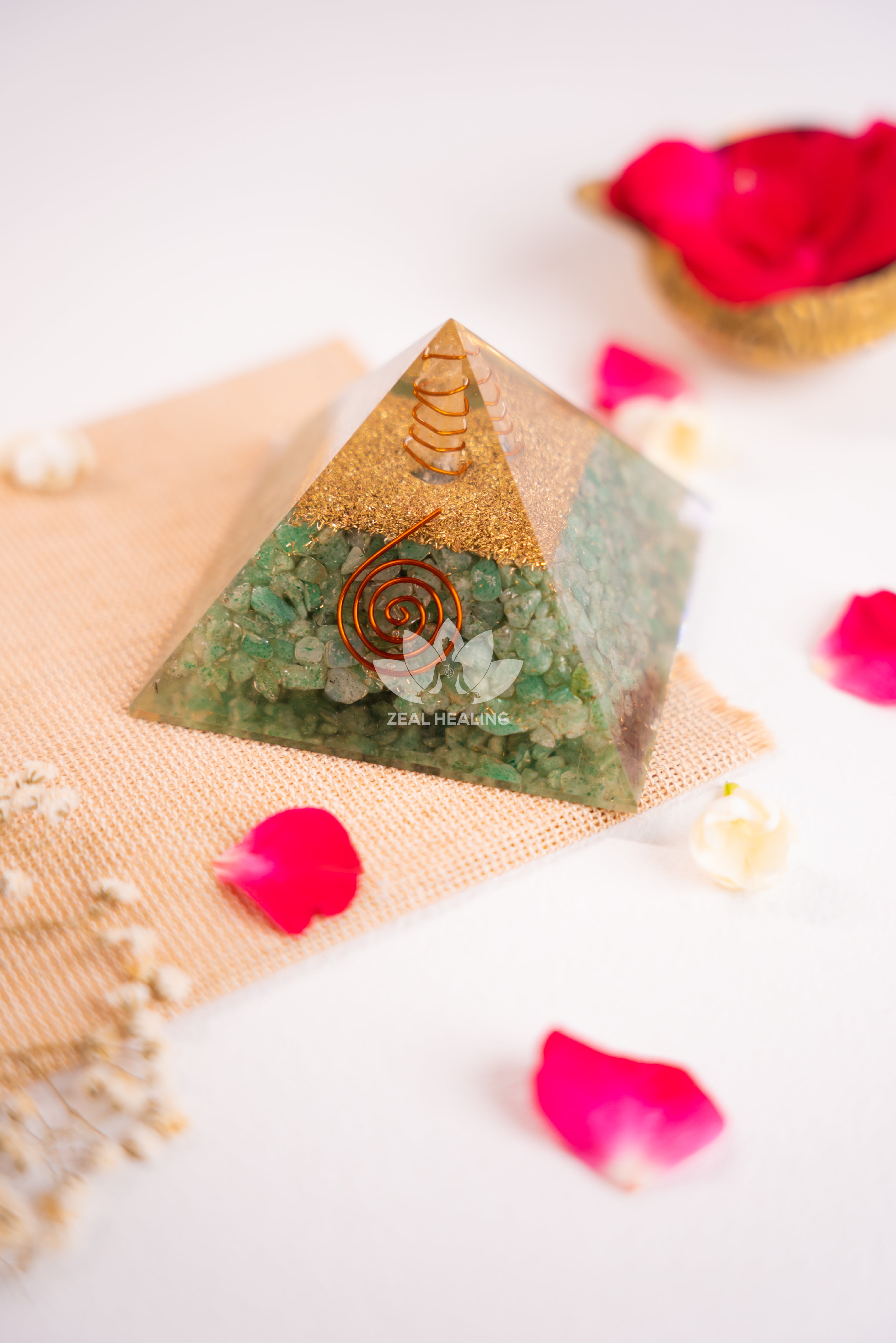 Polished Green Aventurine pyramid radiating calming and positive energy.