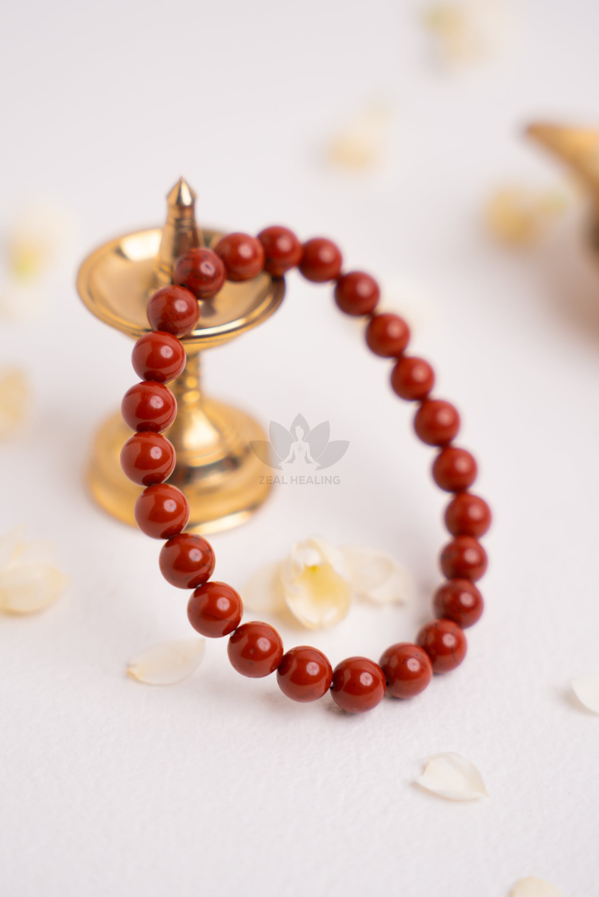 Polished Red Jasper bracelet – supports balance, protection, and inner strength