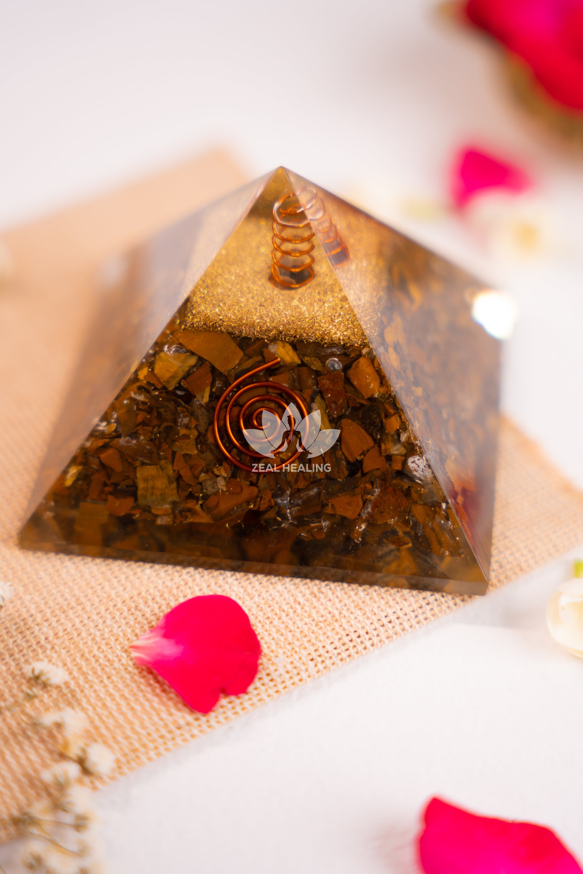 Golden-brown Tiger's Eye pyramid, Reiki energized for courage and confidence.