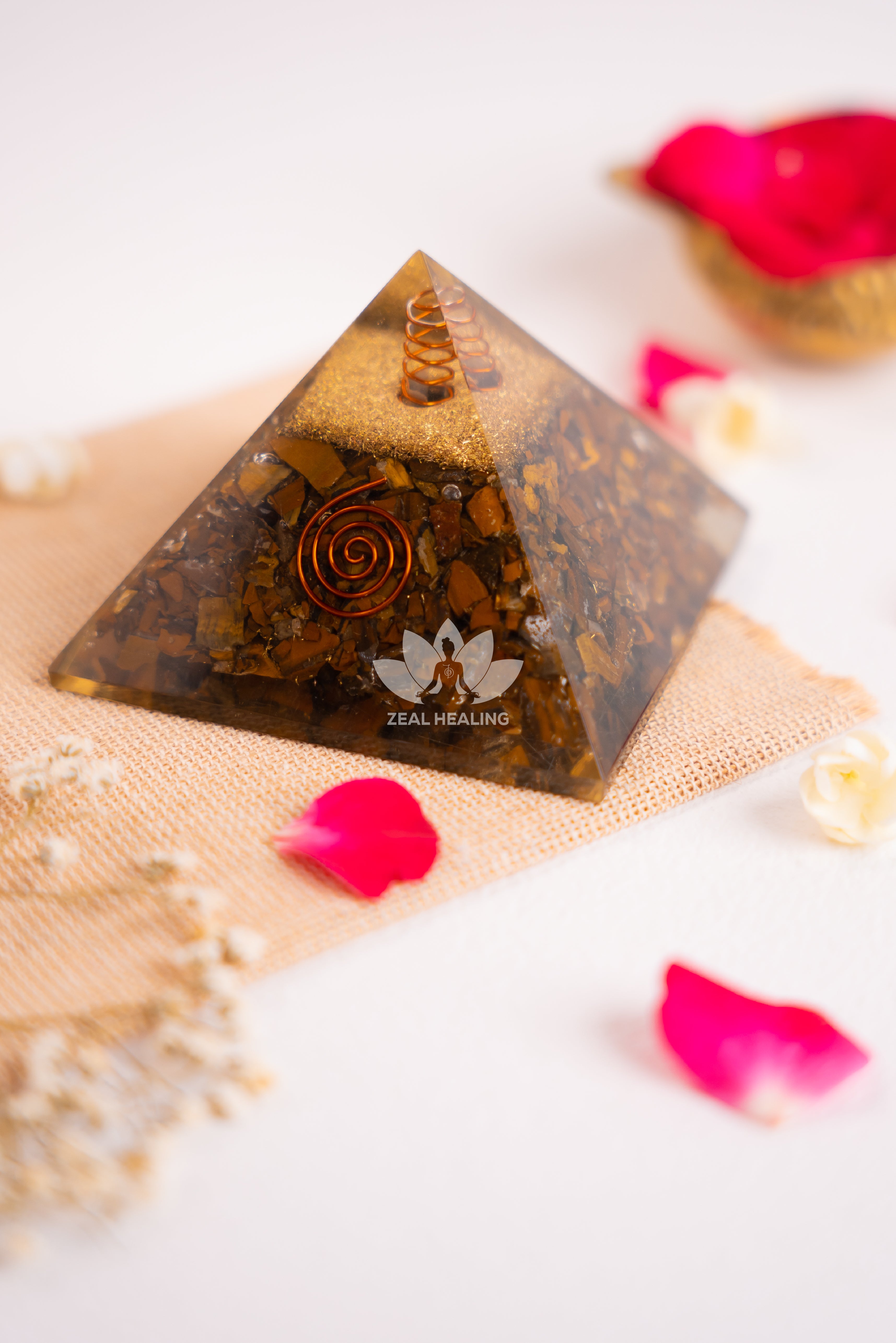 Golden-brown Tiger's Eye pyramid, Reiki energized for courage and confidence.